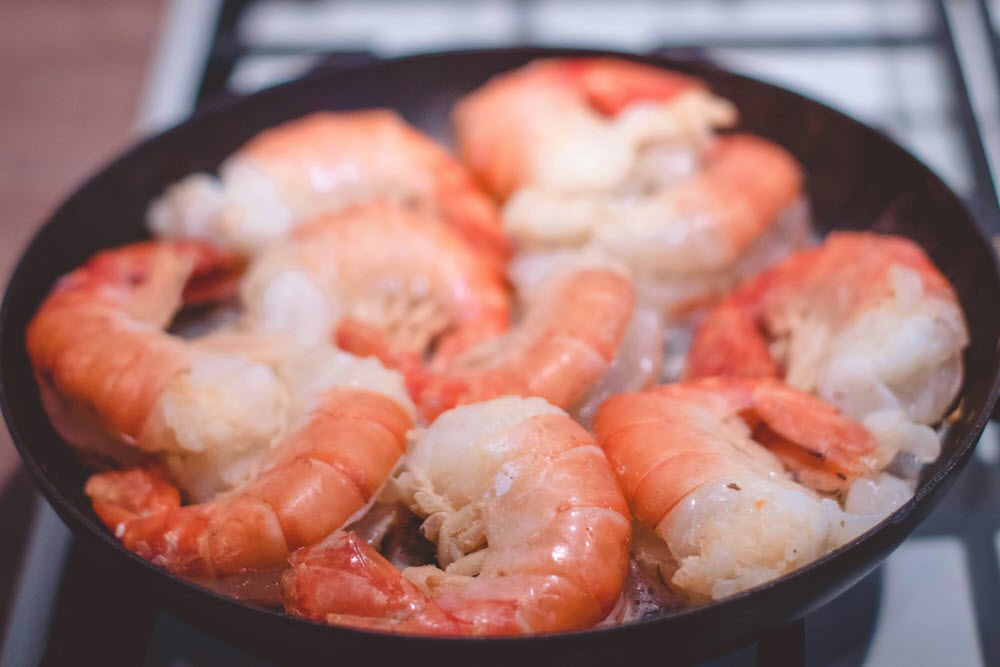 a bowl of cooked shrimp