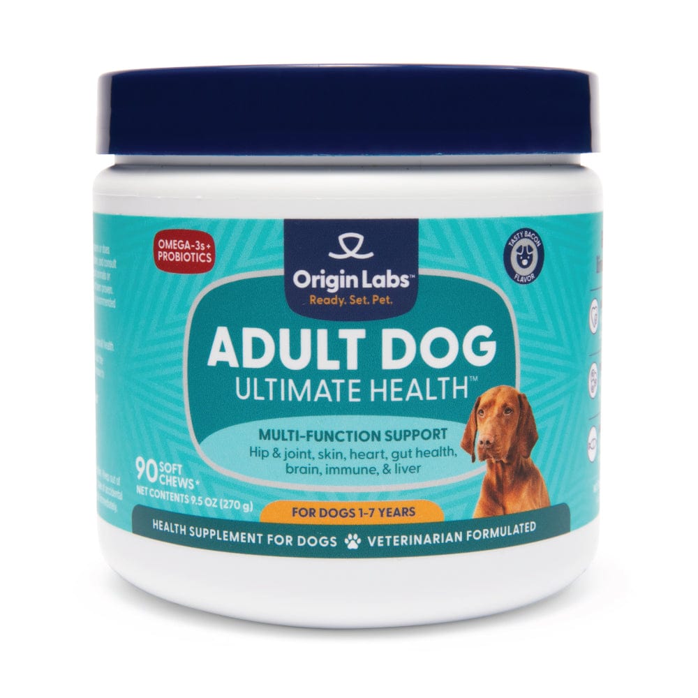 Container of Origin Labs Belly Buddies Probiotics for dogs, with heart-shaped chews in front.